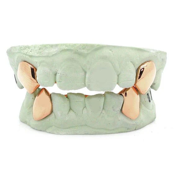 2 single teeth with back bar